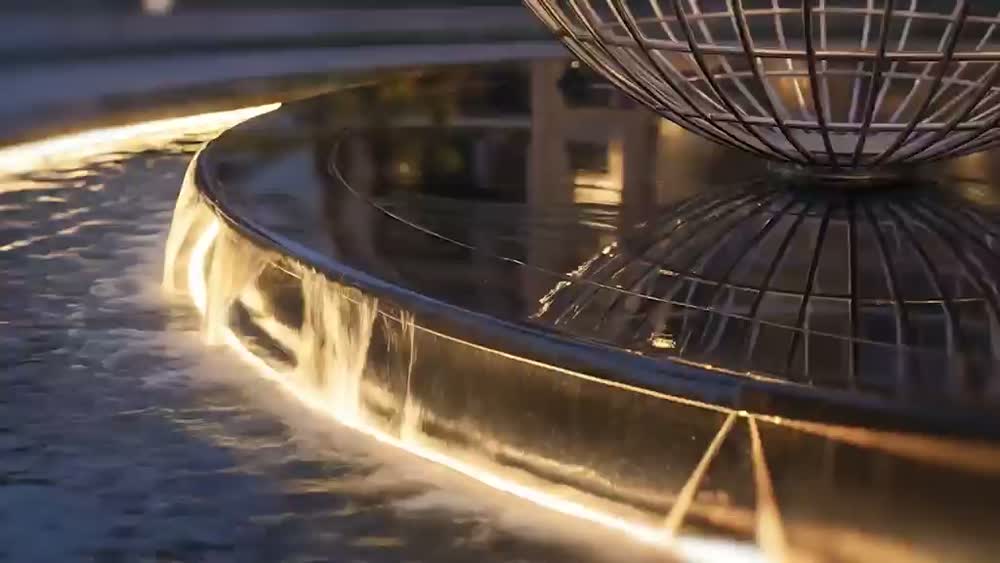 A short architectural detail film from the reference collection, including an illuminated sculptural water feature.